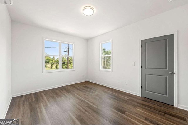 585 Ira St SW, Atlanta, GA 30312 - spare room with baseboards and dark wood finished floors