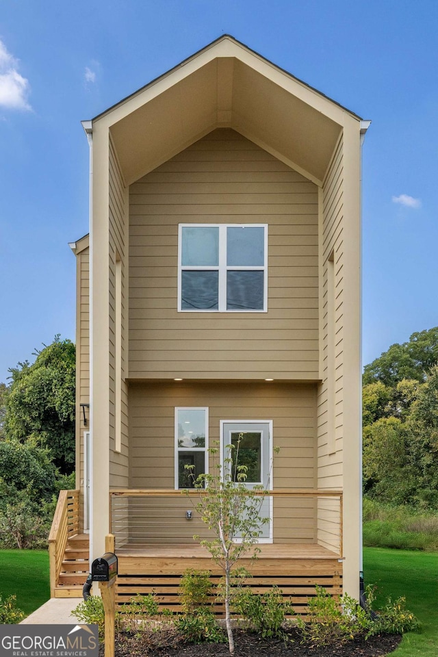 585 Ira St SW, Atlanta, GA 30312 - rear view of house with a lawn and a wooden deck