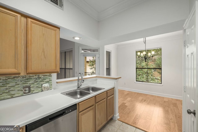 3777 Peachtree Rd Unit 1536, Atlanta, GA 30319 - kitchen with a notable chandelier, a sink, tasteful backsplash, stainless steel dishwasher, and ornamental molding