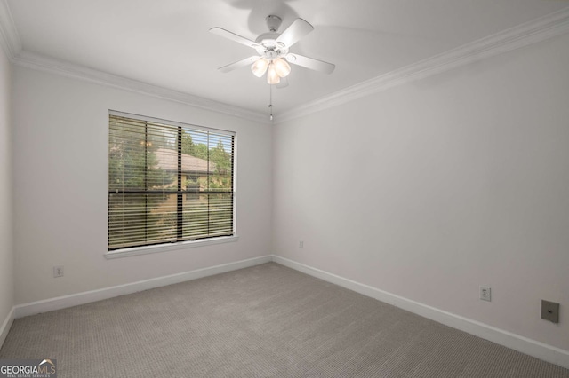3777 Peachtree Rd Unit 1536, Atlanta, GA 30319 - spare room with baseboards, ornamental molding, light carpet, and a ceiling fan