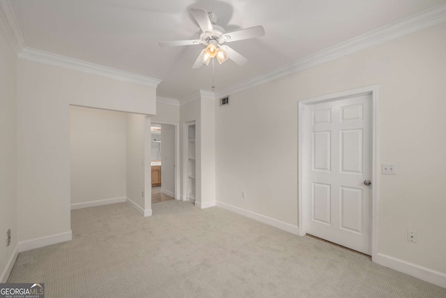 3777 Peachtree Rd Unit 1536, Atlanta, GA 30319 - unfurnished bedroom with crown molding, light colored carpet, a ceiling fan, baseboards, and visible vents