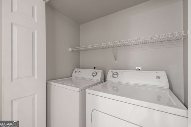 3777 Peachtree Rd Unit 1536, Atlanta, GA 30319 - laundry room with laundry area and independent washer and dryer