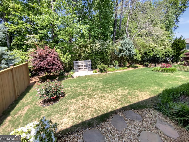 view of yard with fence