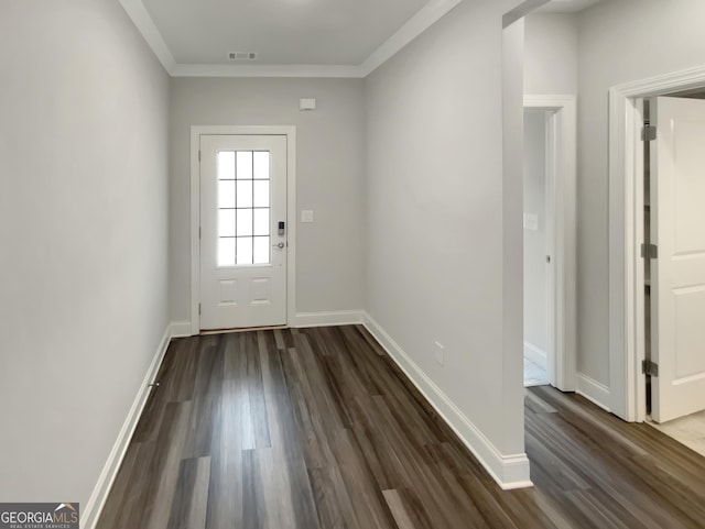 entryway featuring crown molding, baseboards, and dark wood-style floors