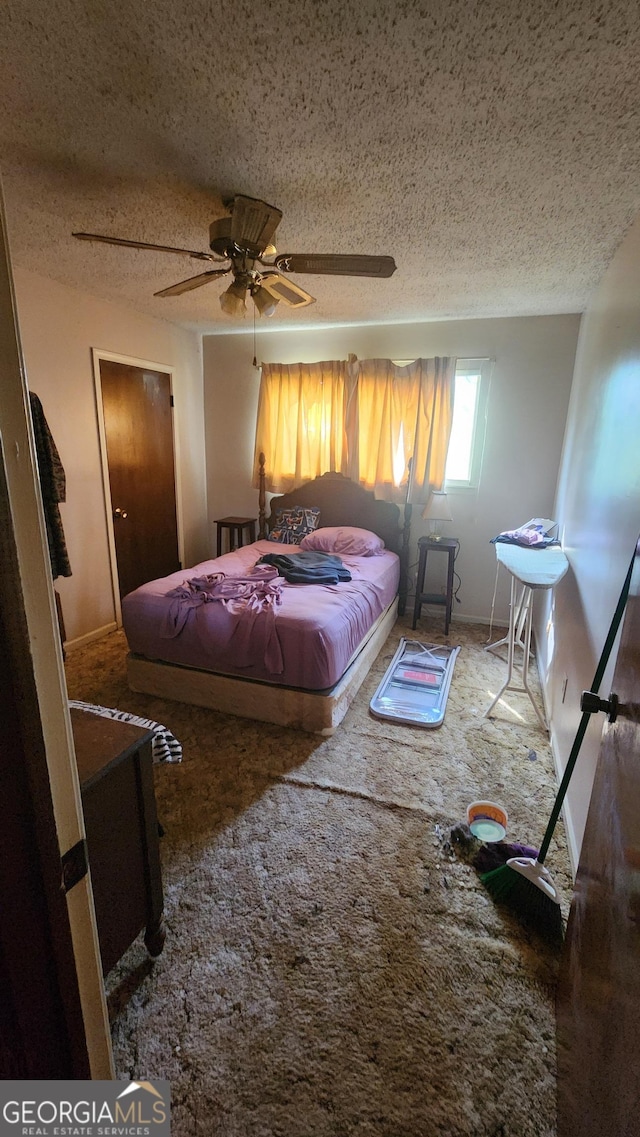 402 Emmett St, Riverdale, GA 30274 - bedroom with a textured ceiling and ceiling fan