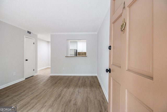 1225 Church St Unit A, Decatur, GA 30030 - spare room featuring wood finished floors and crown molding