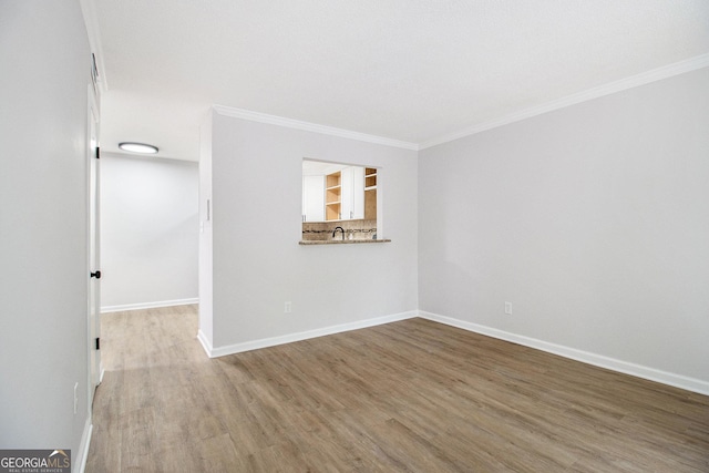 1225 Church St Unit A, Decatur, GA 30030 - spare room with wood finished floors and crown molding