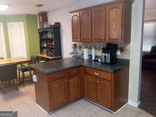 143 Delane Dr, Dallas, GA 30157 - bar with backsplash, visible vents, and light tile patterned floors