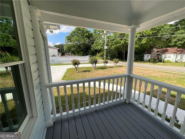 wooden terrace featuring a porch