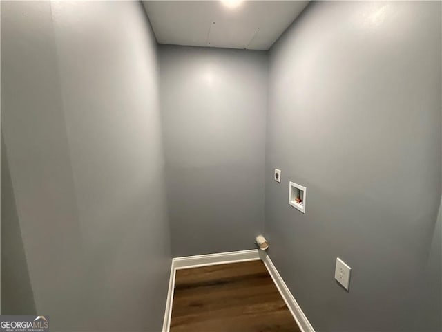 clothes washing area with hookup for an electric dryer, washer hookup, wood finished floors, baseboards, and attic access