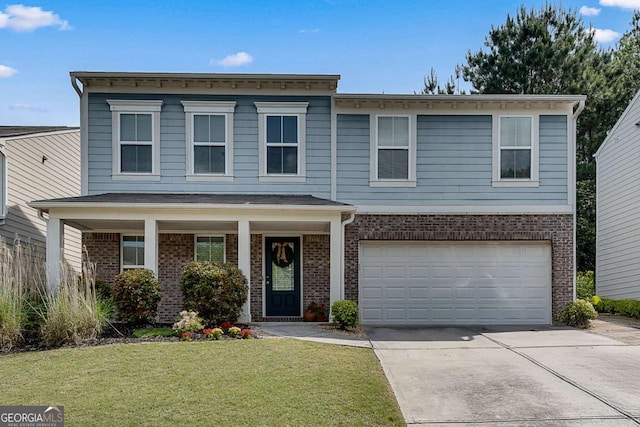view of front of home with brick siding, a garage, driveway, and a front lawn