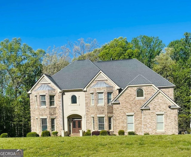 209 Kingscastle Dr, Ellenwood, GA 30294 - view of front facade with a front lawn