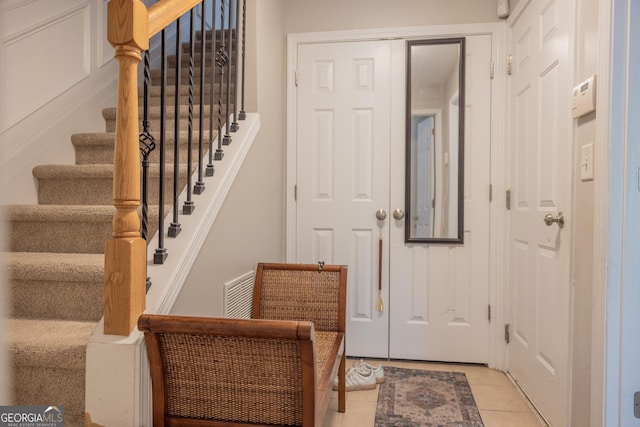 1306 Thornborough Dr Unit 1306, Alpharetta, GA 30004 - foyer featuring stairway and light tile patterned floors