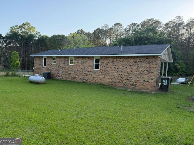 184 Quail Rd, Griffin, GA 30223 - back of property with a yard, cooling unit, and crawl space