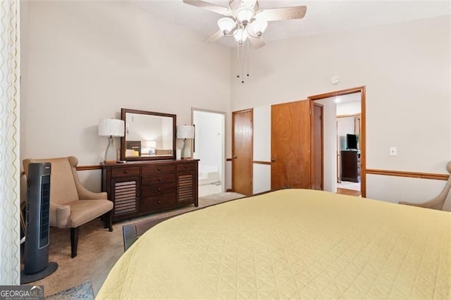 1149 Midland NW, Acworth, GA 30102 - carpeted bedroom with a high ceiling, ceiling fan, and connected bathroom