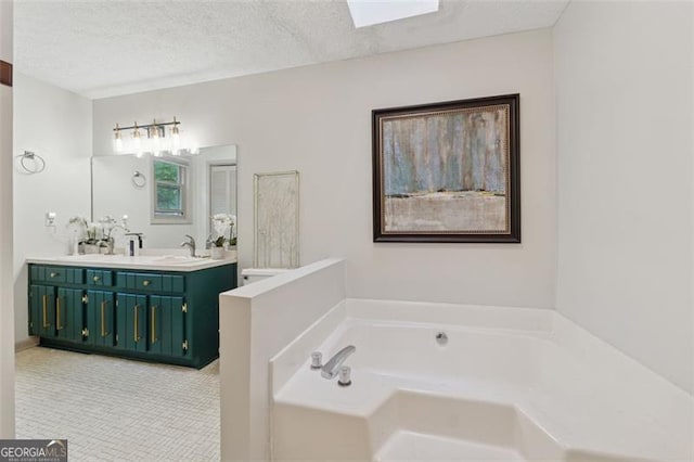 1149 Midland NW, Acworth, GA 30102 - full bathroom featuring double vanity, a bath, and a textured ceiling