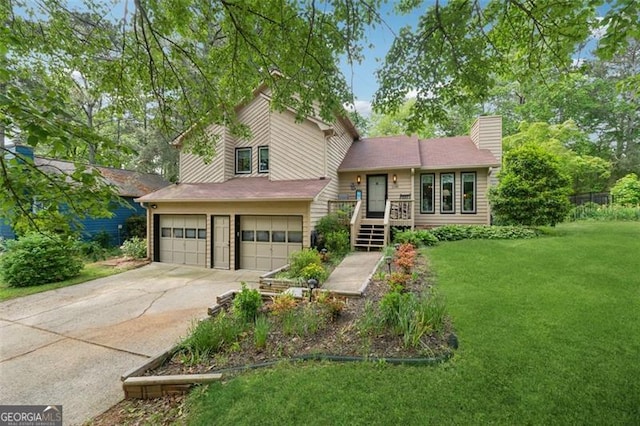 1149 Midland NW, Acworth, GA 30102 - split level home with driveway, a garage, a front yard, and a chimney