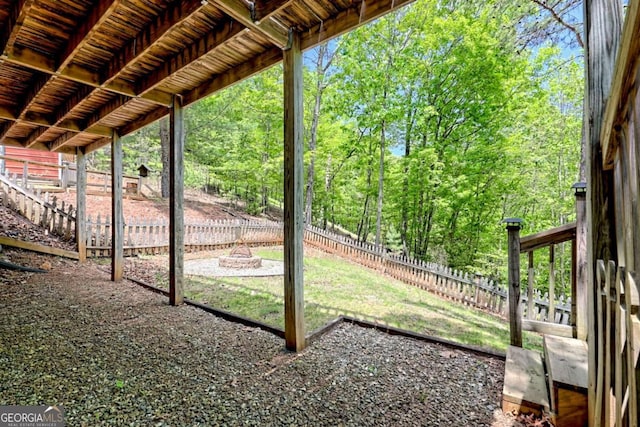view of yard featuring fence private yard and a fire pit
