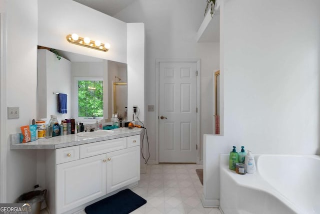 569 Hale Mountain Ct, Hiram, GA 30141 - full bathroom with a garden tub, tile patterned floors, a stall shower, and vanity
