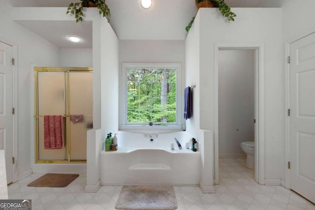 569 Hale Mountain Ct, Hiram, GA 30141 - full bath featuring baseboards, a stall shower, toilet, and a bath