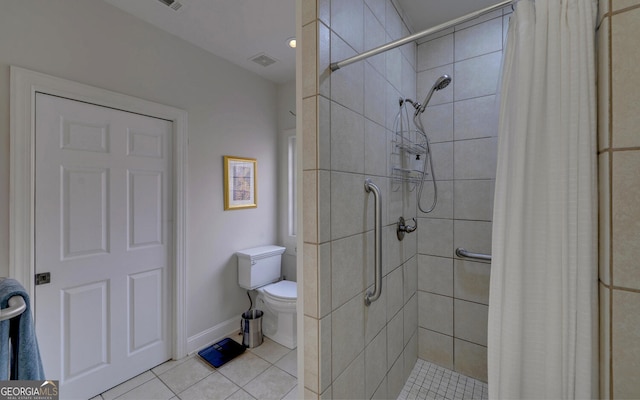 922 Brenau Point Dr, Gainesville, GA 30501 - full bathroom with toilet, tile patterned floors, baseboards, a shower stall, and visible vents