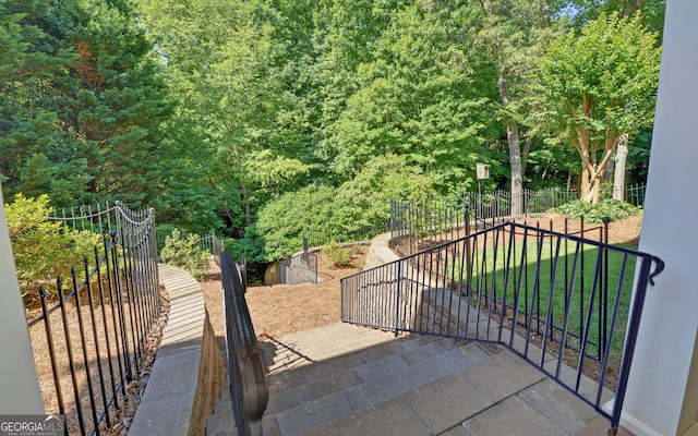 922 Brenau Point Dr, Gainesville, GA 30501 - view of gate with an outdoor structure, fence, and a shed