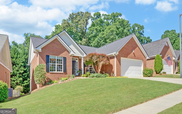 922 Brenau Point Dr, Gainesville, GA 30501 - single story home with an attached garage, concrete driveway, a front yard, and brick siding