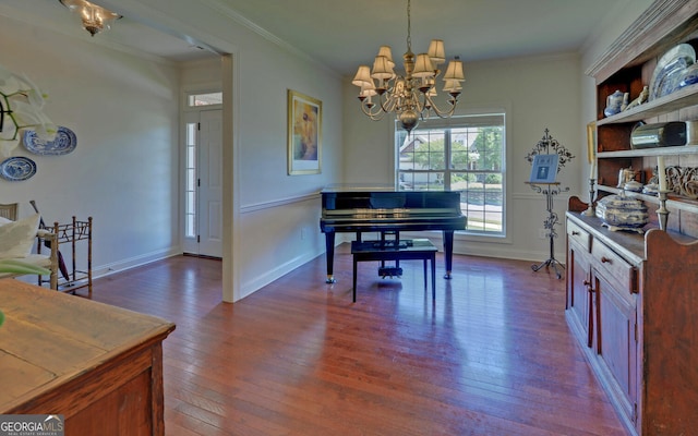 922 Brenau Point Dr, Gainesville, GA 30501 - dining space featuring dark wood-type flooring, baseboards, crown molding, and a notable chandelier