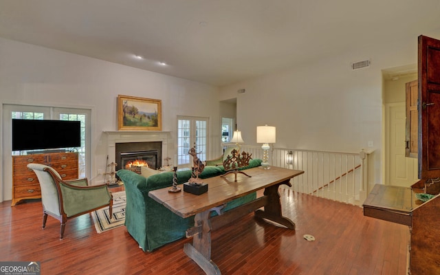 922 Brenau Point Dr, Gainesville, GA 30501 - living room with wood finished floors, plenty of natural light, and a glass covered fireplace