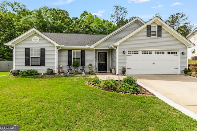 view of front of house featuring a garage, roof with shingles, concrete driveway, and a front lawn