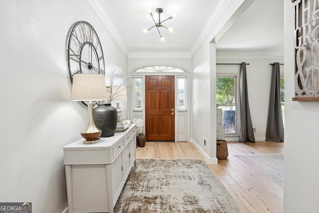 109 Old Virginia Cir, Jonesboro, GA 30236 - foyer with light wood-style flooring, a chandelier, ornamental molding, and baseboards