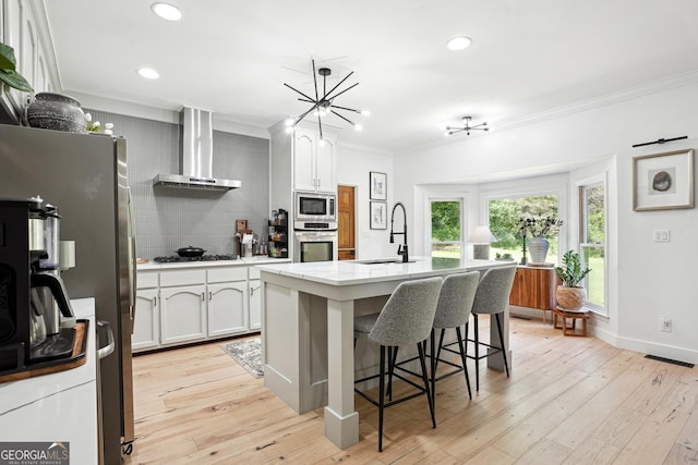 109 Old Virginia Cir, Jonesboro, GA 30236 - kitchen with a sink, wall chimney exhaust hood, stainless steel appliances, ornamental molding, and tasteful backsplash