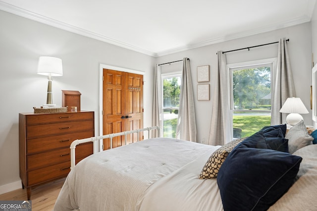 109 Old Virginia Cir, Jonesboro, GA 30236 - bedroom with ornamental molding, light wood-style flooring, and baseboards