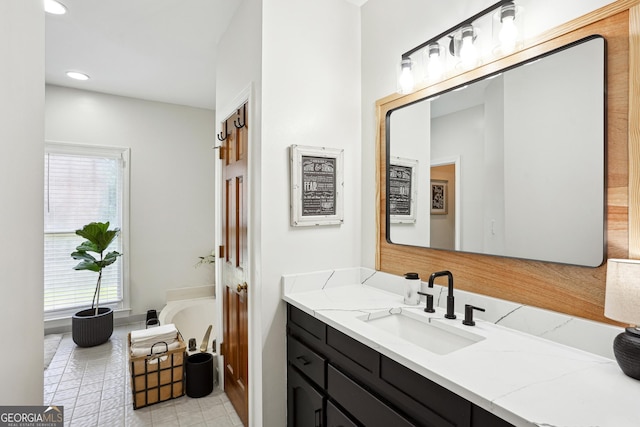 109 Old Virginia Cir, Jonesboro, GA 30236 - bathroom with a garden tub, vanity, recessed lighting, and tile patterned floors