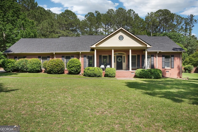109 Old Virginia Cir, Jonesboro, GA 30236 - view of front of house with covered porch, brick siding, a front lawn, and roof with shingles