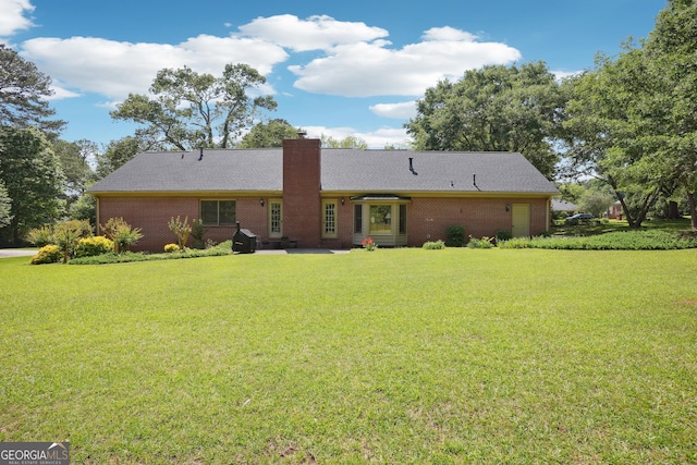 109 Old Virginia Cir, Jonesboro, GA 30236 - rear view of house with a lawn, a patio, a chimney, and brick siding