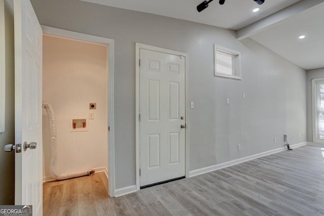 entrance foyer with vaulted ceiling with beams, recessed lighting, baseboards, and wood finished floors
