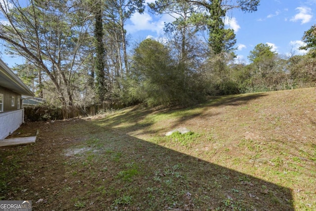 view of yard featuring fence
