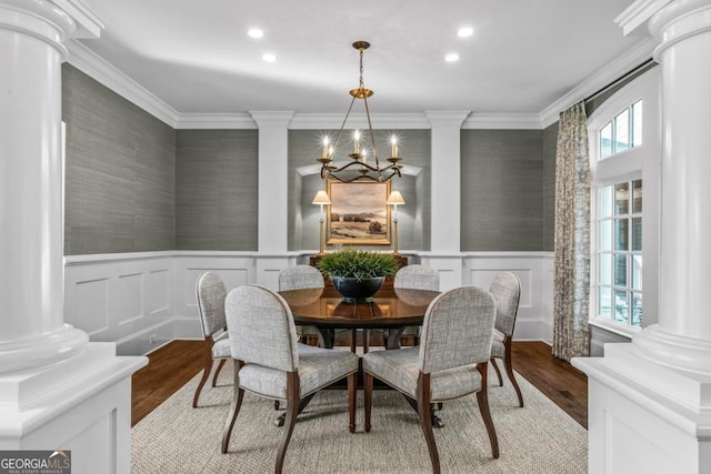 dining area with crown molding, wainscoting, ornate columns, recessed lighting, and light wood-type flooring