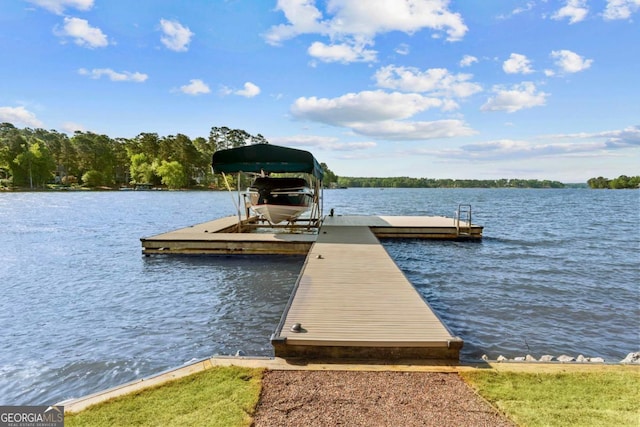 dock area featuring a water view and boat lift