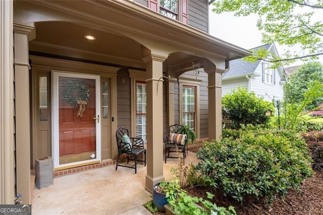 entrance to property featuring a porch