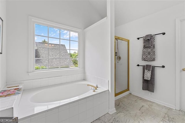 full bath with a healthy amount of sunlight, a shower stall, a bath, and marble finish floor