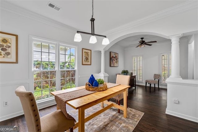 dining area featuring plenty of natural light, ornamental molding, decorative columns, and visible vents