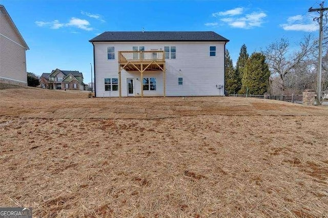 rear view of house with a deck
