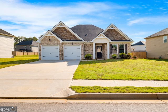1341 Midnight Ride Ct, Hampton, GA 30228 - craftsman inspired home with fence, an attached garage, concrete driveway, and a front lawn