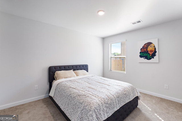 1341 Midnight Ride Ct, Hampton, GA 30228 - bedroom with baseboards, carpet, and visible vents