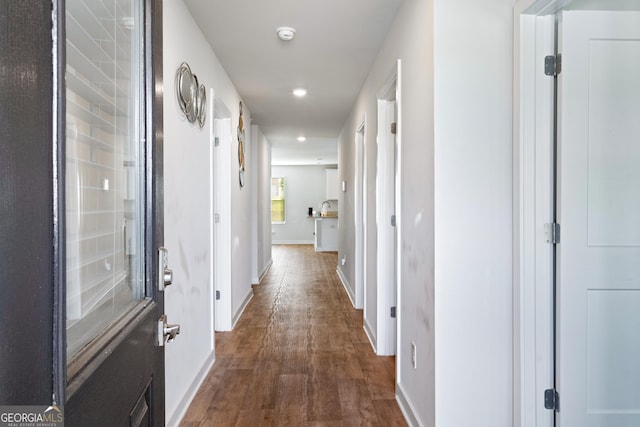 1341 Midnight Ride Ct, Hampton, GA 30228 - hallway with recessed lighting, baseboards, and dark wood-type flooring