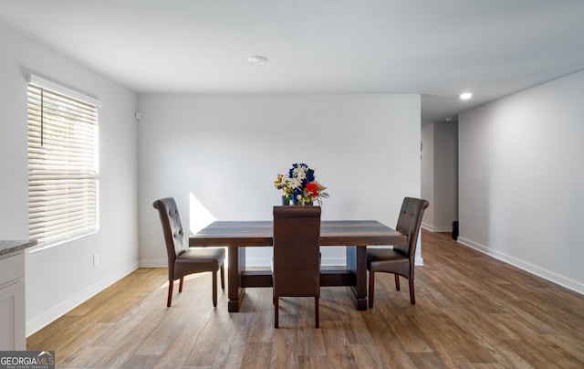 1341 Midnight Ride Ct, Hampton, GA 30228 - dining area featuring recessed lighting, baseboards, and light wood-style flooring