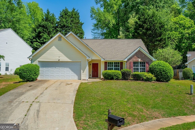 ranch-style home featuring a garage, concrete driveway, a front yard, a shingled roof, and brick siding