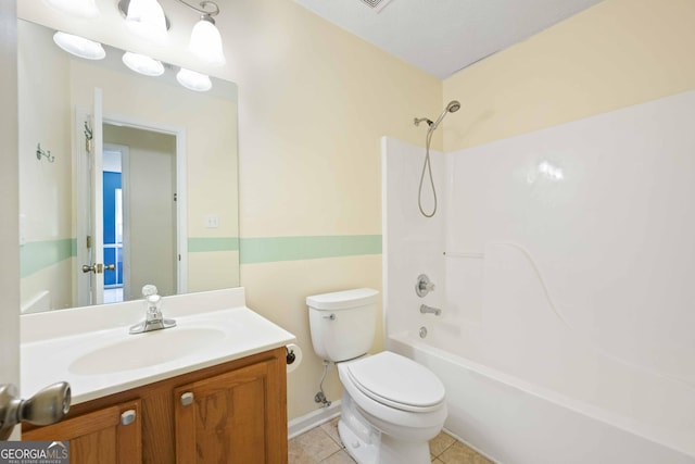 bathroom featuring toilet, vanity, bathtub / shower combination, and tile patterned flooring